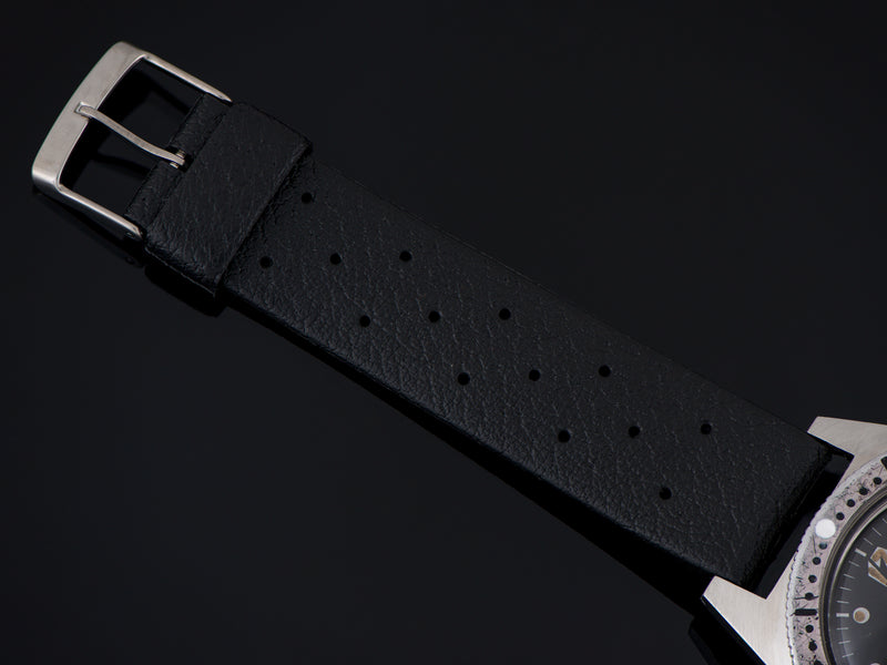 Brand new old stock rubber black strap with matching silver tone buckle