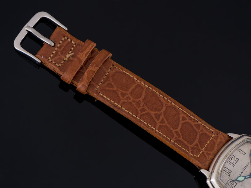 Brand new old stock genuine Leather Brown Crocodile Grain Strap with matching Silver Colored Buckle