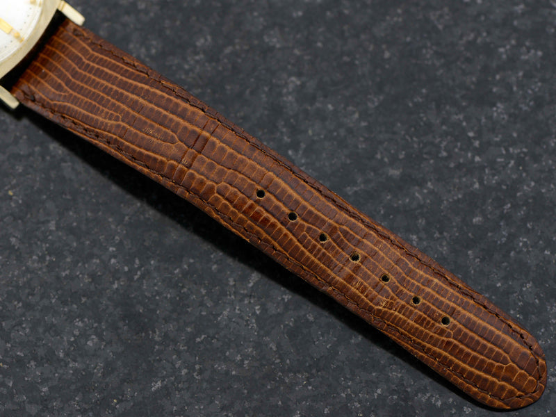 Brand new genuine leather Black Snake Grain Band with matching Gold Colored Buckle