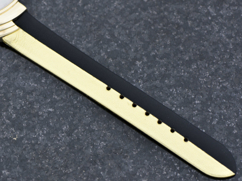 Brand New Reissue Gold Black Band to match the original, with matching gold tone buckle